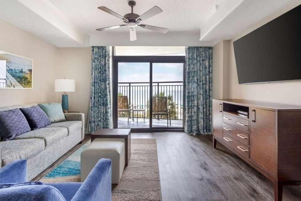 Unwind on the sofa with sweeping seaside views.