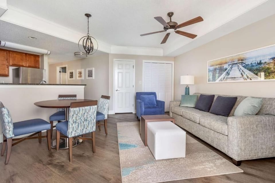Gather for meals and movie nights in airy comfort.