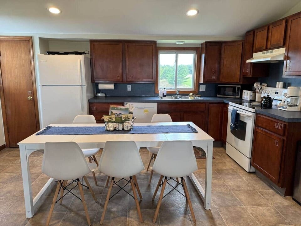 The large dining table near the kitchen is great for those times you want to bake cookies or make a big breakfast. 