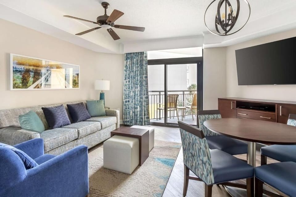 Enjoy relaxed dinners and movie nights in one open space.