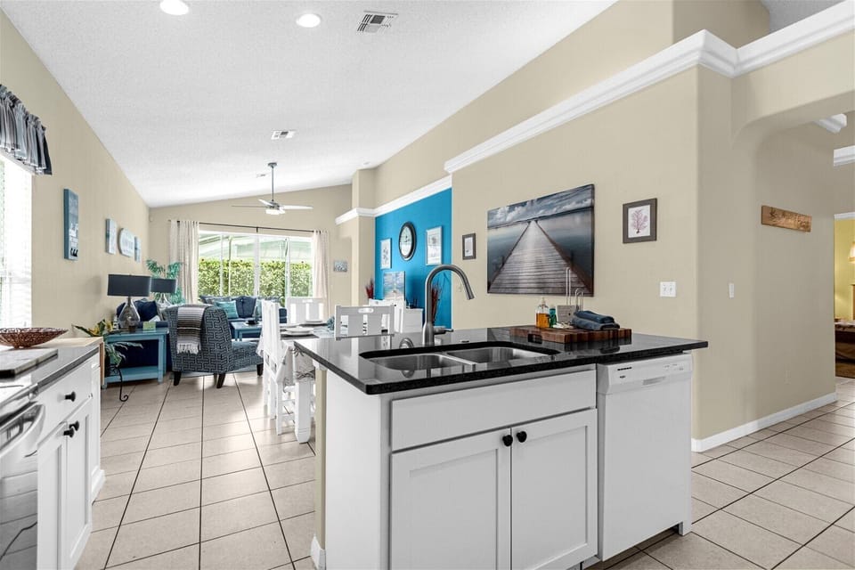 Kitchen And Back Living Room Area and Dining Area