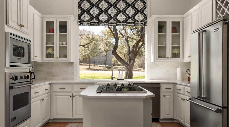 Enjoy cooking in this beautifully updated kitchen featuring premium Viking appliances and modern finishes.