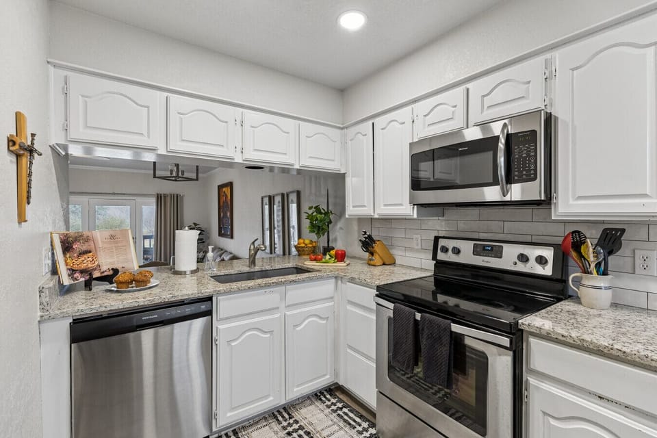 Kitchen | Stainless Steel Appliances | Upper Cabinets & Tile Backsplash
