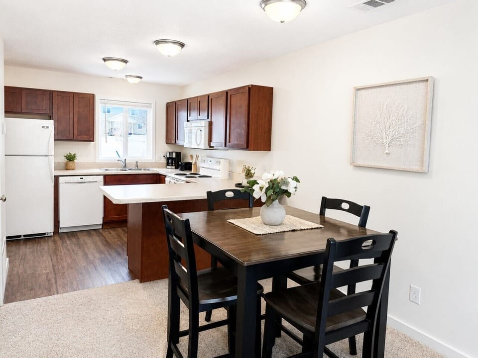 Bright dining with easy kitchen access.