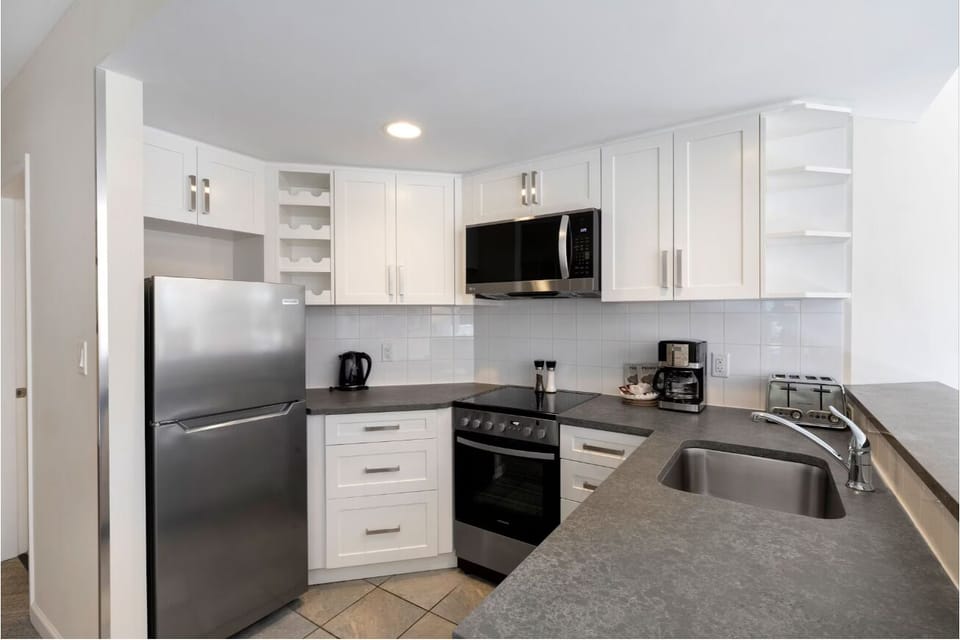 Cook easy meals in the bright, fully equipped kitchen.