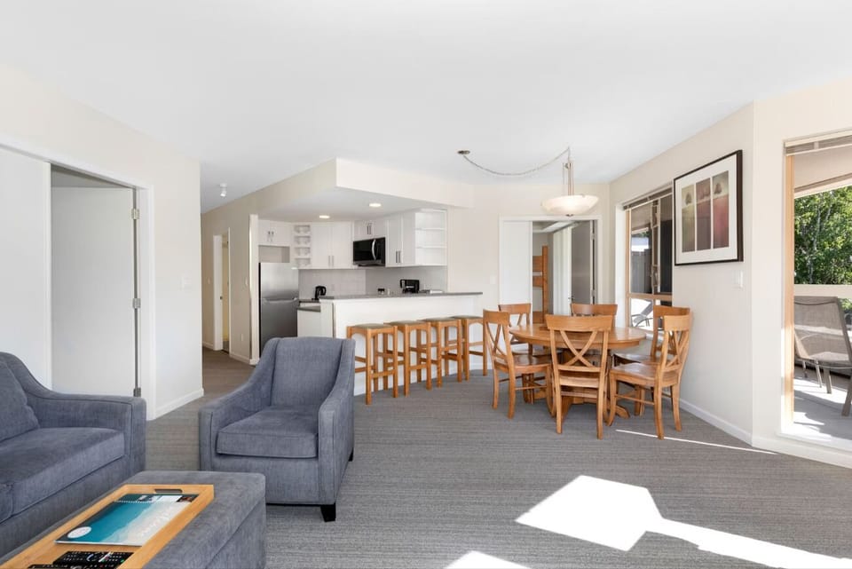 Host easy meals together in bright open-plan living spaces.