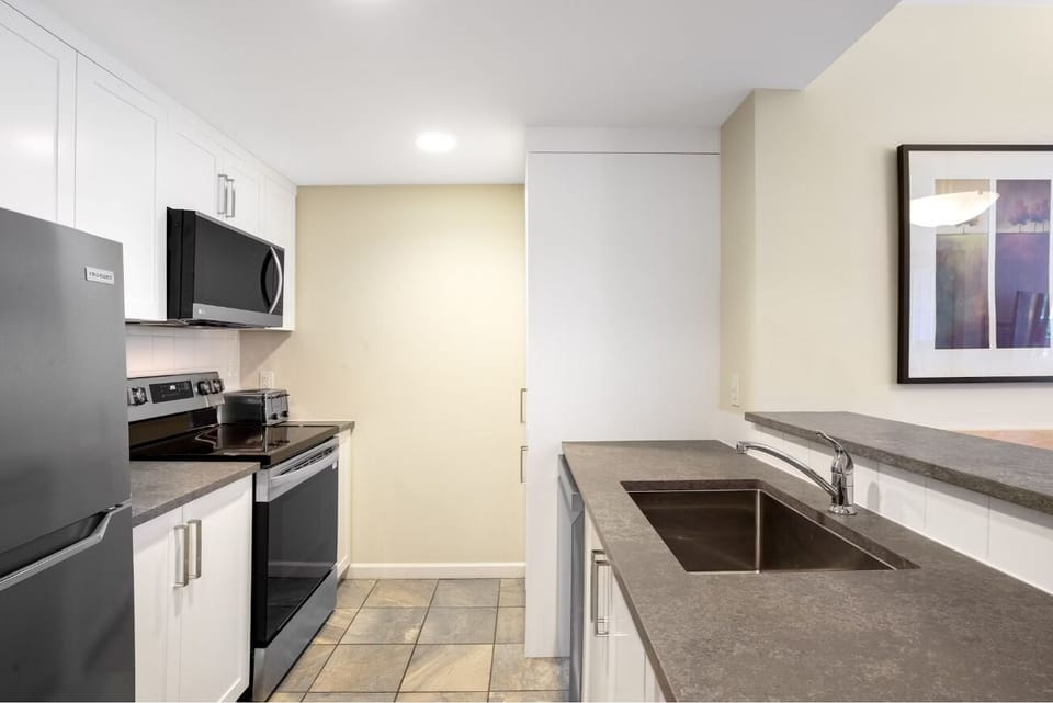 Spread out ingredients and enjoy the sleek, modern kitchenette flow.