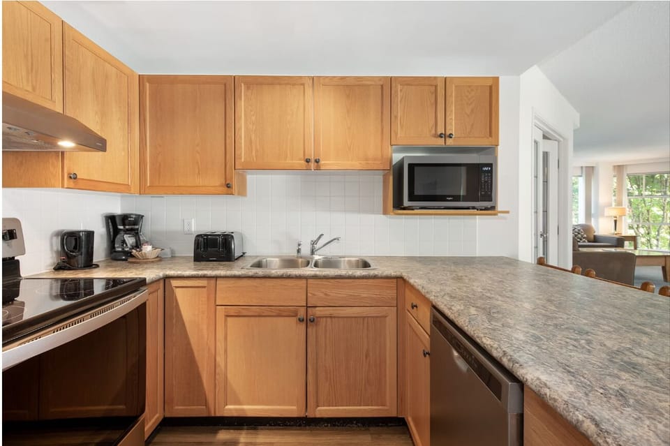 Prep morning coffee with plenty of counter space and light.