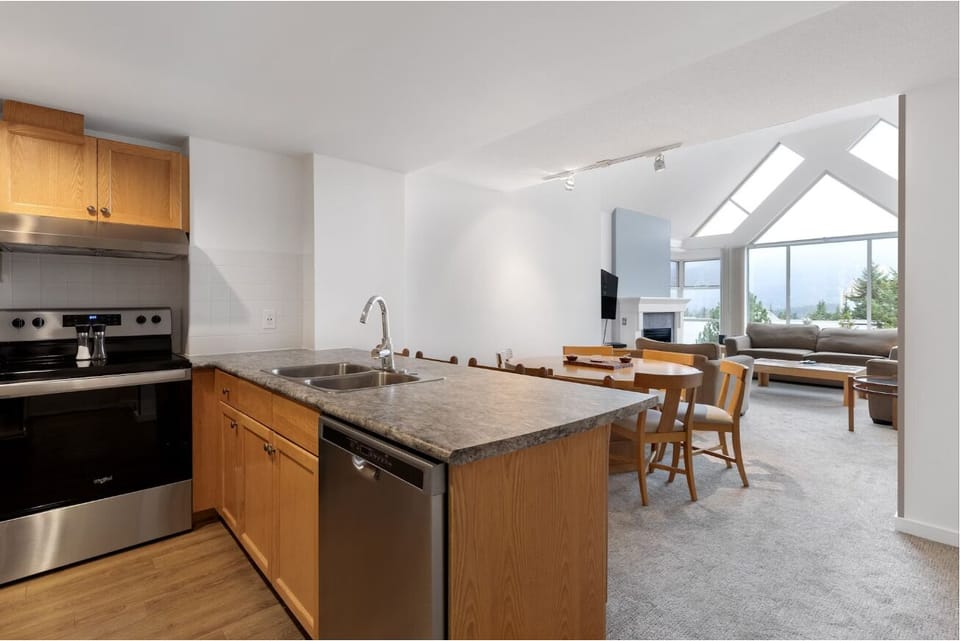 Prepare meals comfortably with generous counters and open-concept flow.