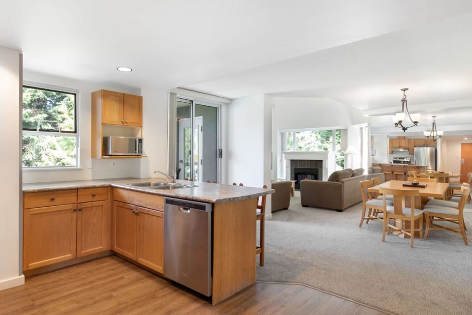 Cook together in the open kitchen with breakfast bar seating.