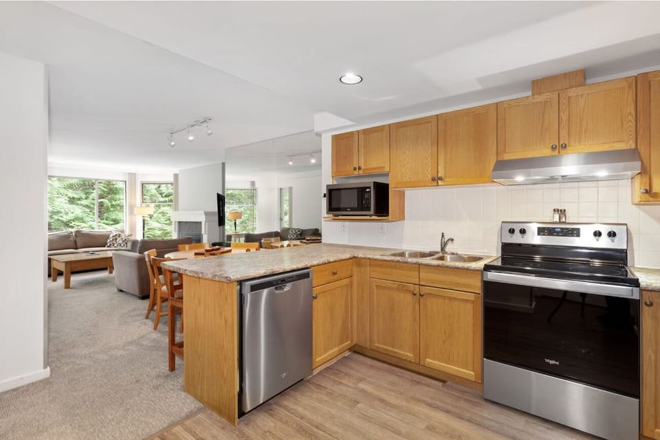 Cook together in the open kitchen with casual bar seating.