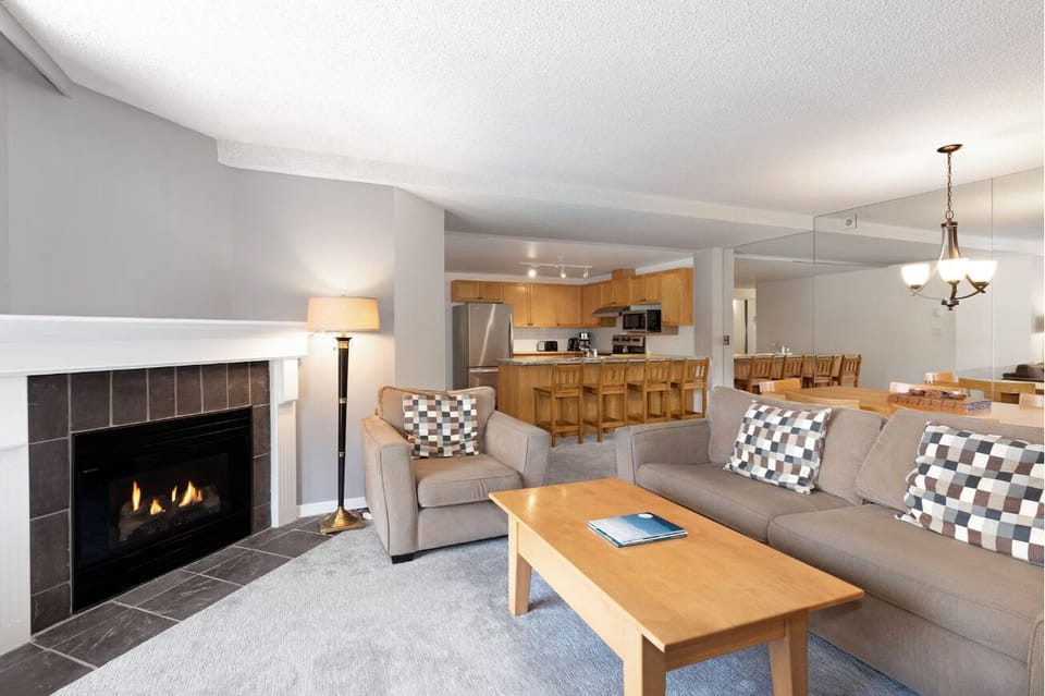 Host easy evenings with open-concept comfort and fireside ambiance.