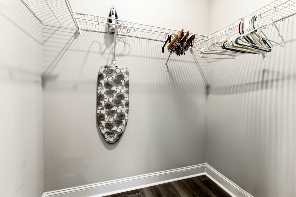 Walk-In Closet | Wire Shelving | Hanging Rods & Ironing Board