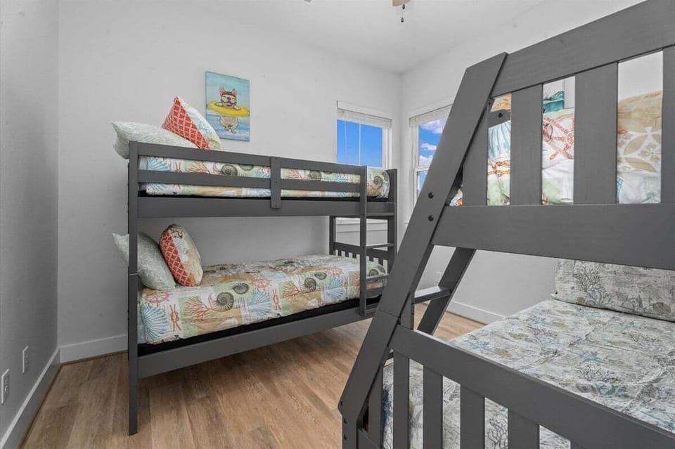 Spacious bunk bedroom designed for families and groups visiting Galveston TX vacation rental.