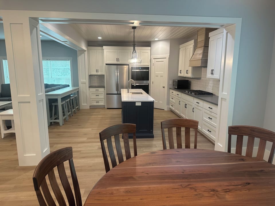 Open concept dining, family room and kitchen.