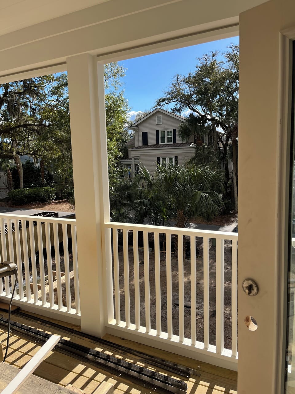 View from screened porch overlooking pool, spa and yard!
