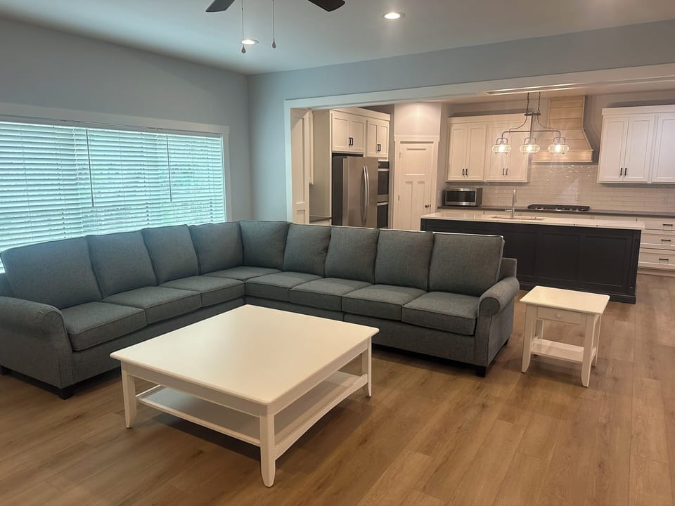 Large kitchen island and family room for entertaining. 