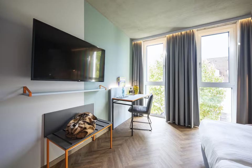 Settle in with big-screen TV and a calm workspace.