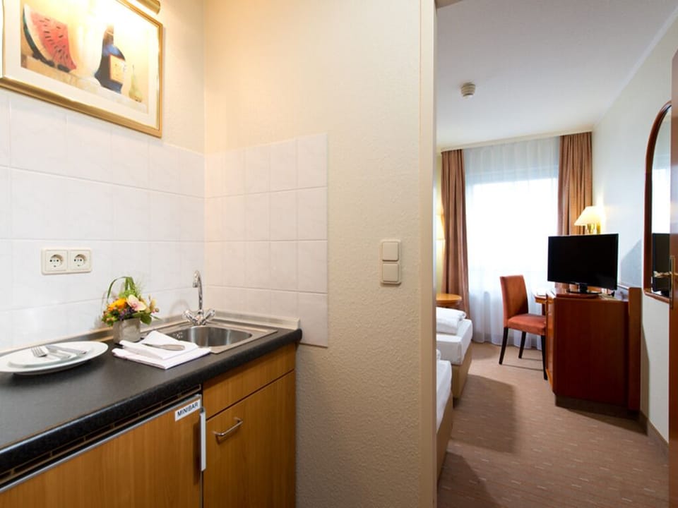 Prepare simple snacks and drinks with an in-room kitchenette.
