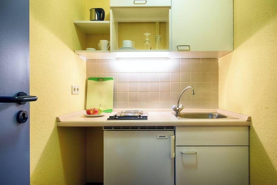 Start mornings with easy meals in your compact kitchenette.