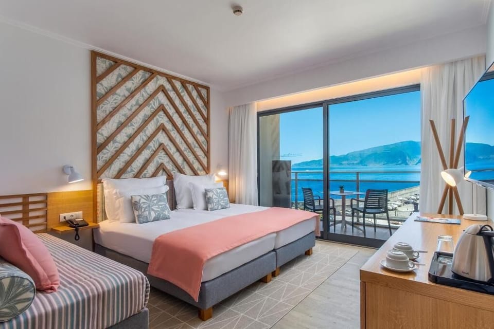 Wake up to ocean views from this airy bedroom.