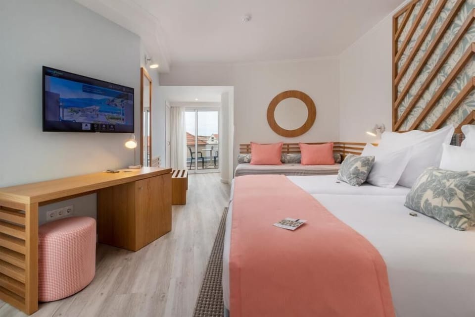 Stretch out on crisp linens in this serene sleeping space.