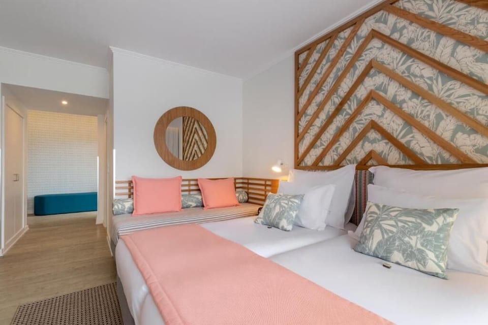 Stretch out comfortably in a bright room with designer details.