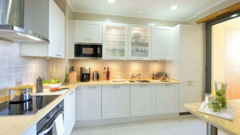 Prepare fresh meals on generous counters with modern appliances.