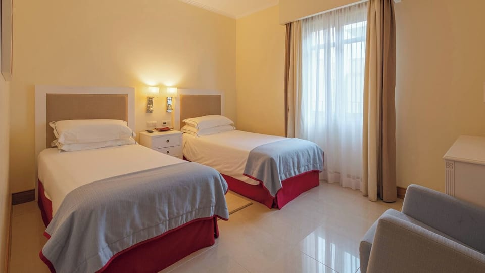 Wake refreshed to gentle daylight and a calm, airy layout.