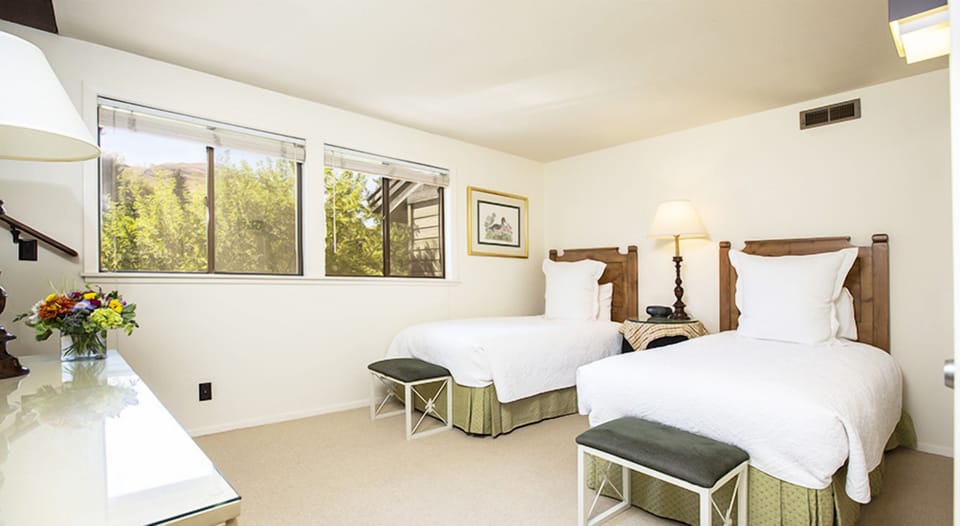 Wake up to soft daylight and a peaceful garden outlook.