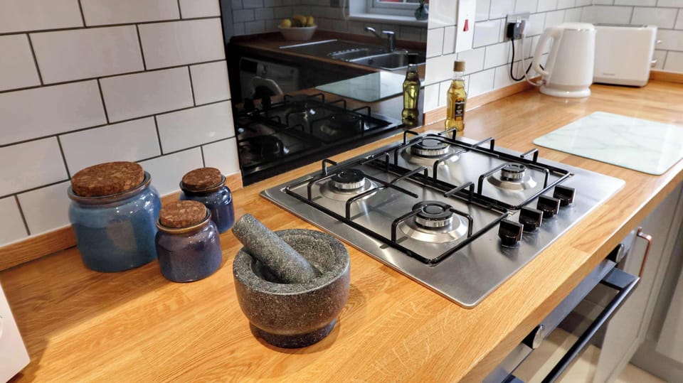 Thoughtful touches throughout the kitchen create a warm and welcoming place to cook, dine and relax during your stay.