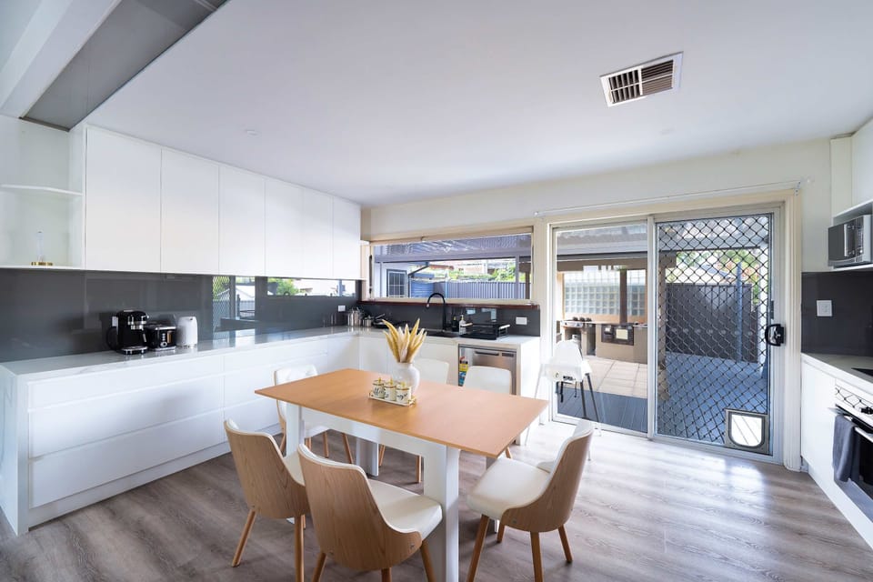 Great size combine dinning table & modern equipped kitchen with coffee machine, toaster, kettle, oven, stove, microwave, dishwasher, large fridge. pots, pans, cutlery, spacious sink. Dining table & chairs plus bright, airy space and ample storage.