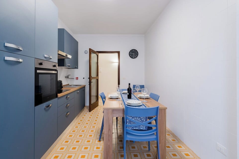 Flooring, Interior Design, Wood, Floor, Major Appliance, Cabinetry, Room, Kitchen, Furniture, Countertop