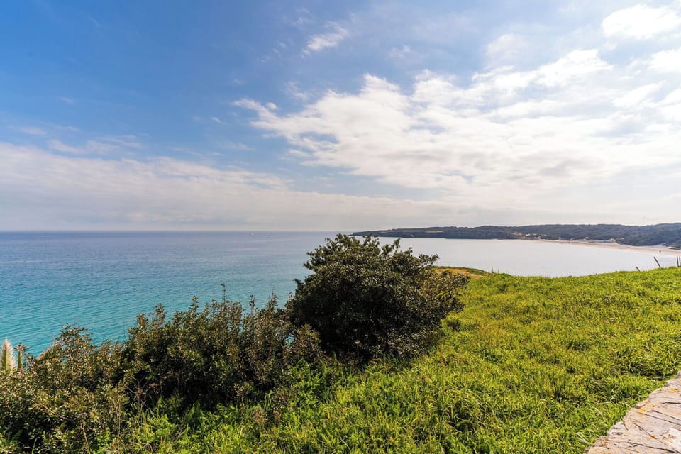 Sky, Blue, Water, Water Resources, Horizon, Green, Body Of Water, Coast, Natural Landscape, Coastal And Oceanic Landforms