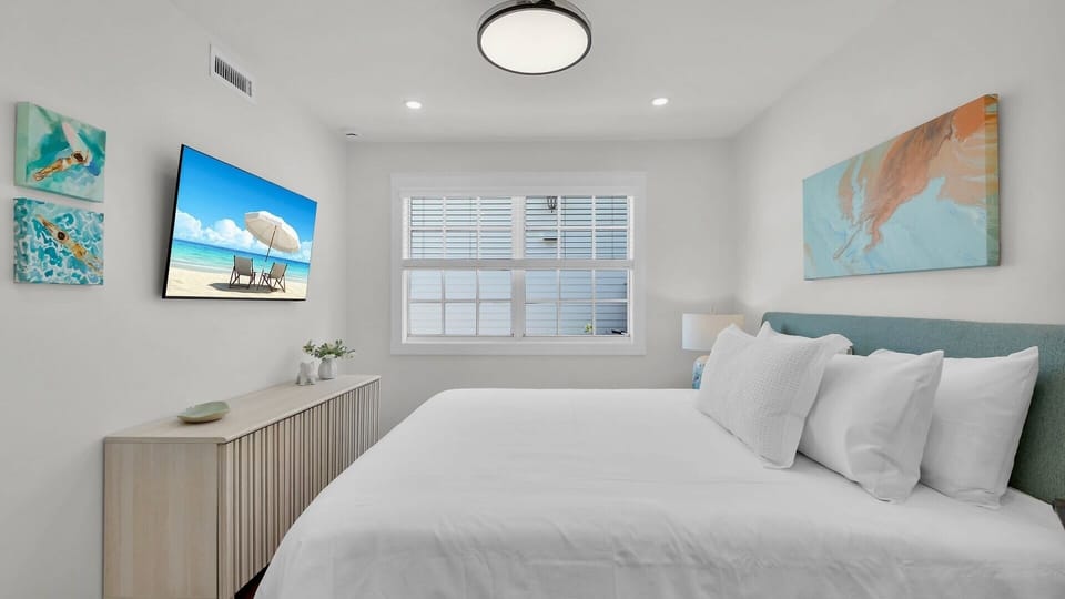 The first bedroom features a flatscreen TV...