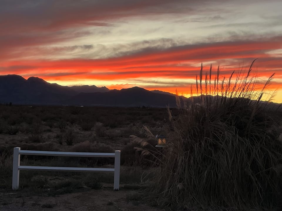 View of sunset from property