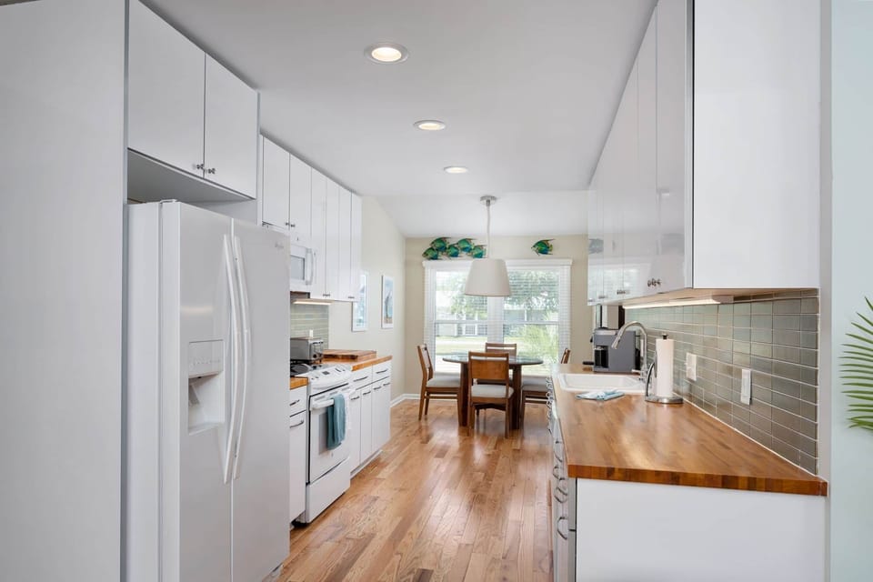 The open kitchen keeps everyone connected, making cooking and entertaining easy while enjoying time 