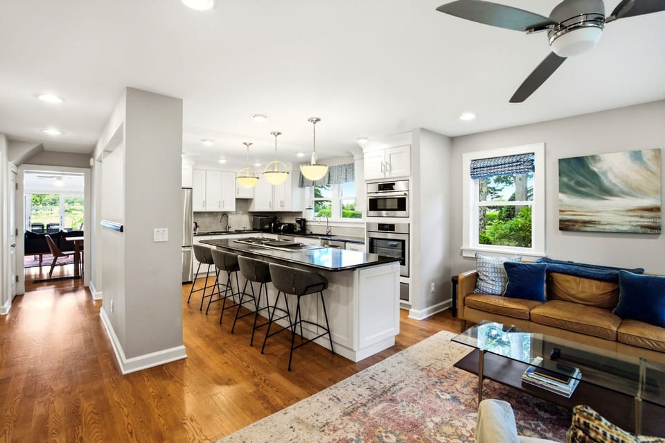 Kitchen with island, bar seating, and Bosch wall oven