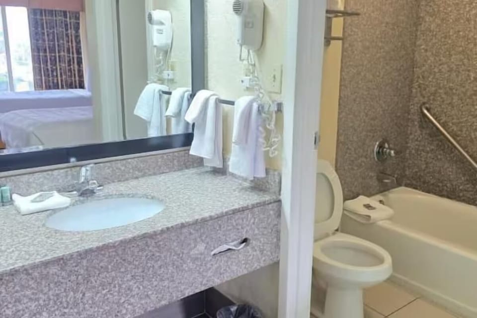 Step into a clean vanity area with soft, even lighting.
