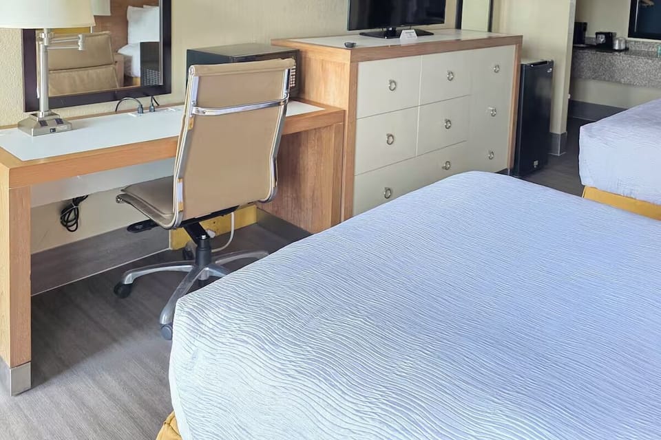 Catch up on work at the roomy desk with easy storage.