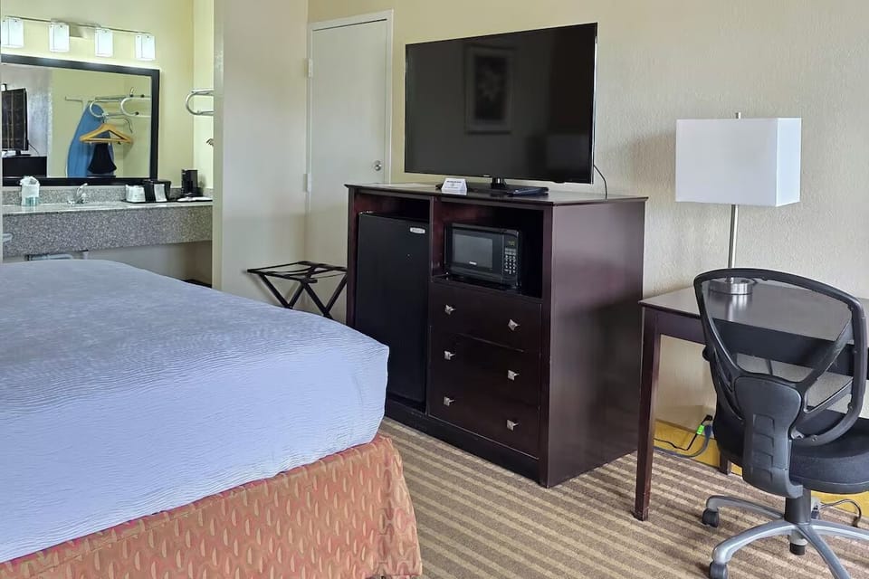 Settle in with a large TV, fridge, and microwave.