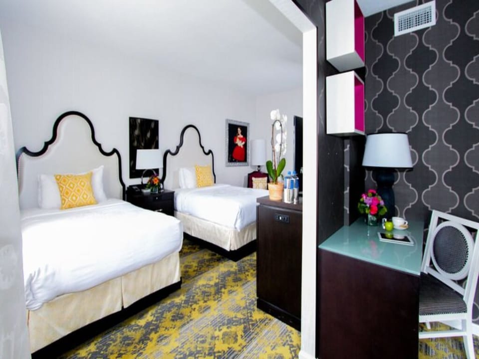 Share the space comfortably with two beds and a work zone.