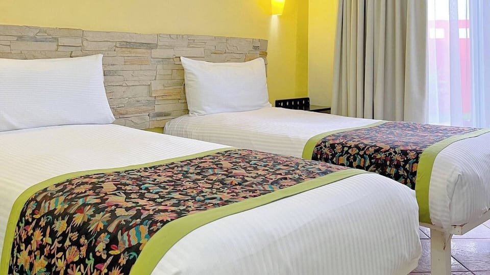 Settle into two crisp beds after a day exploring.