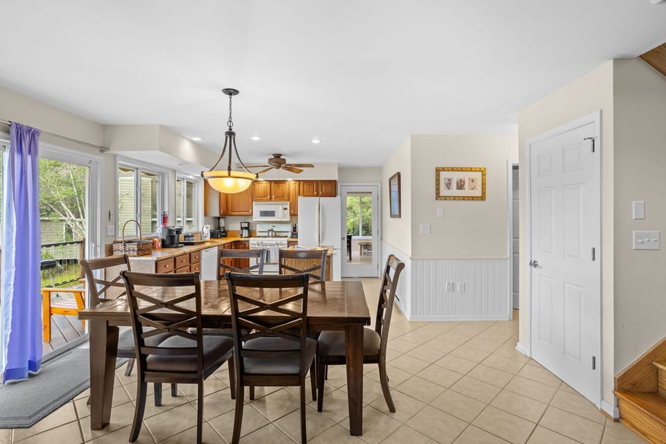 The kitchen and dining area are ready for home-cooked meals