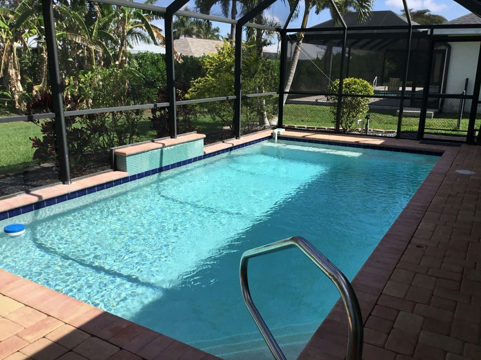 12x24 foot heated pool with waterfall that can be on or off. Auto pool filler!