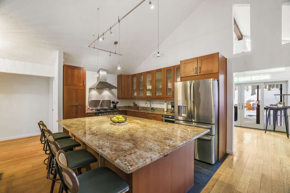 Whip up a gourmet meal or just pour yourself a cup of coffee—our kitchen is ready for your culinary adventures (or just a casual snack).