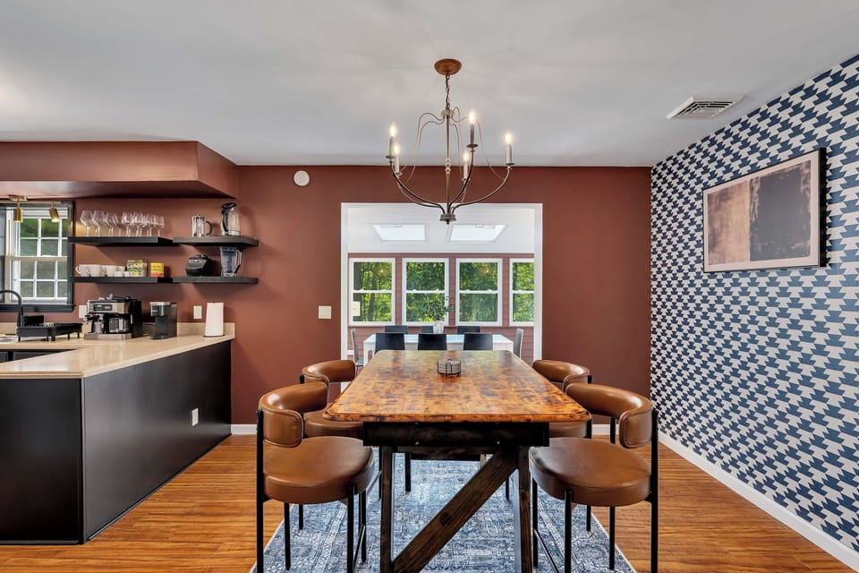 Open kitchen with 5-ft island and four seats for cooking prep and chatting.