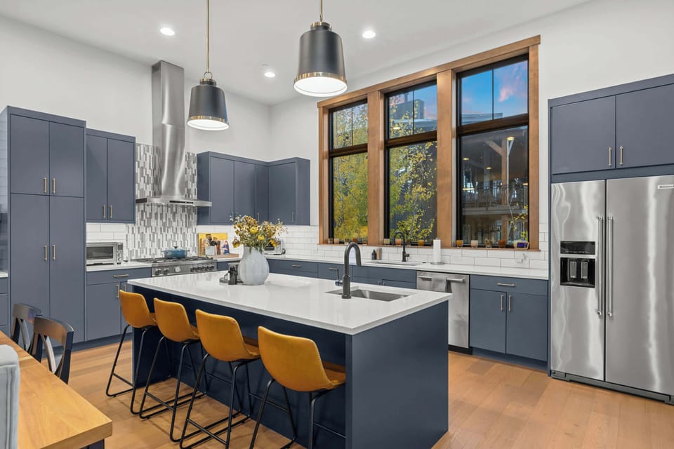 Large kitchen island with bar seating — perfect for cooking and gathering.