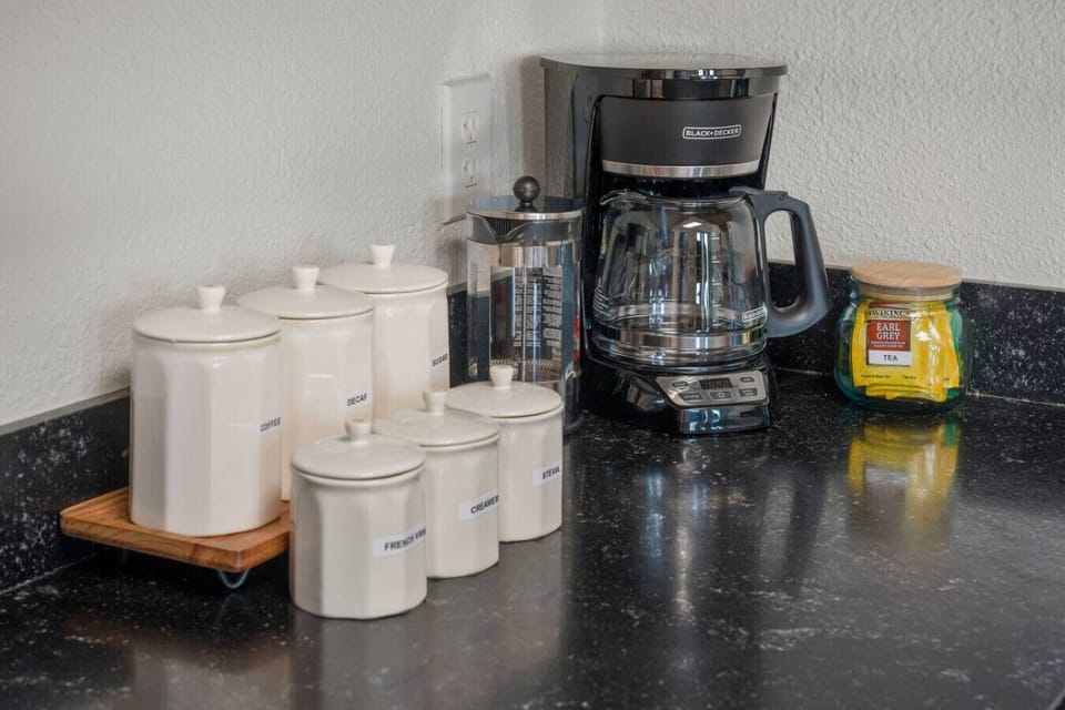 Slow mornings are highly encouraged here. ☕ Regular, decaf, tea, honey, sugar, and creamer — brew it, steep it, or press it. Your call. 😌