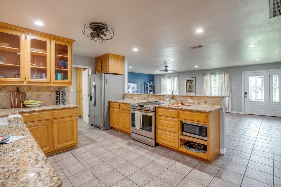 The perfect blend of style and function, complete with four-seat island.